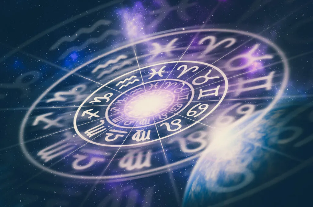 Astrological zodiac signs inside of horoscope circle on universe background - astrology and horoscopes concept, celebrity birthdays image, These Celebrities Have A May Birthday